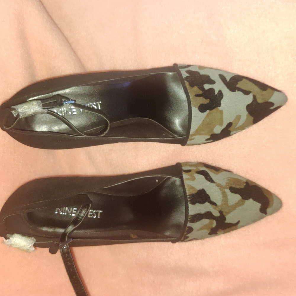 Sexy, sleek leather and cow fur toe shoe